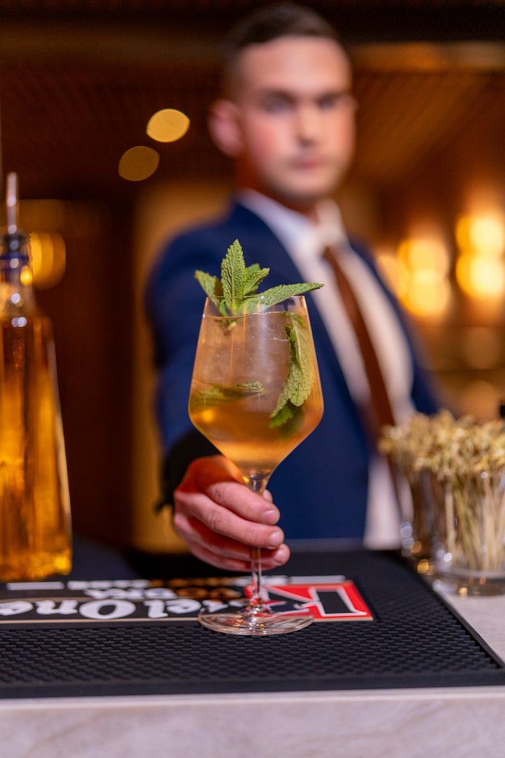 Bartender presenting cocktail