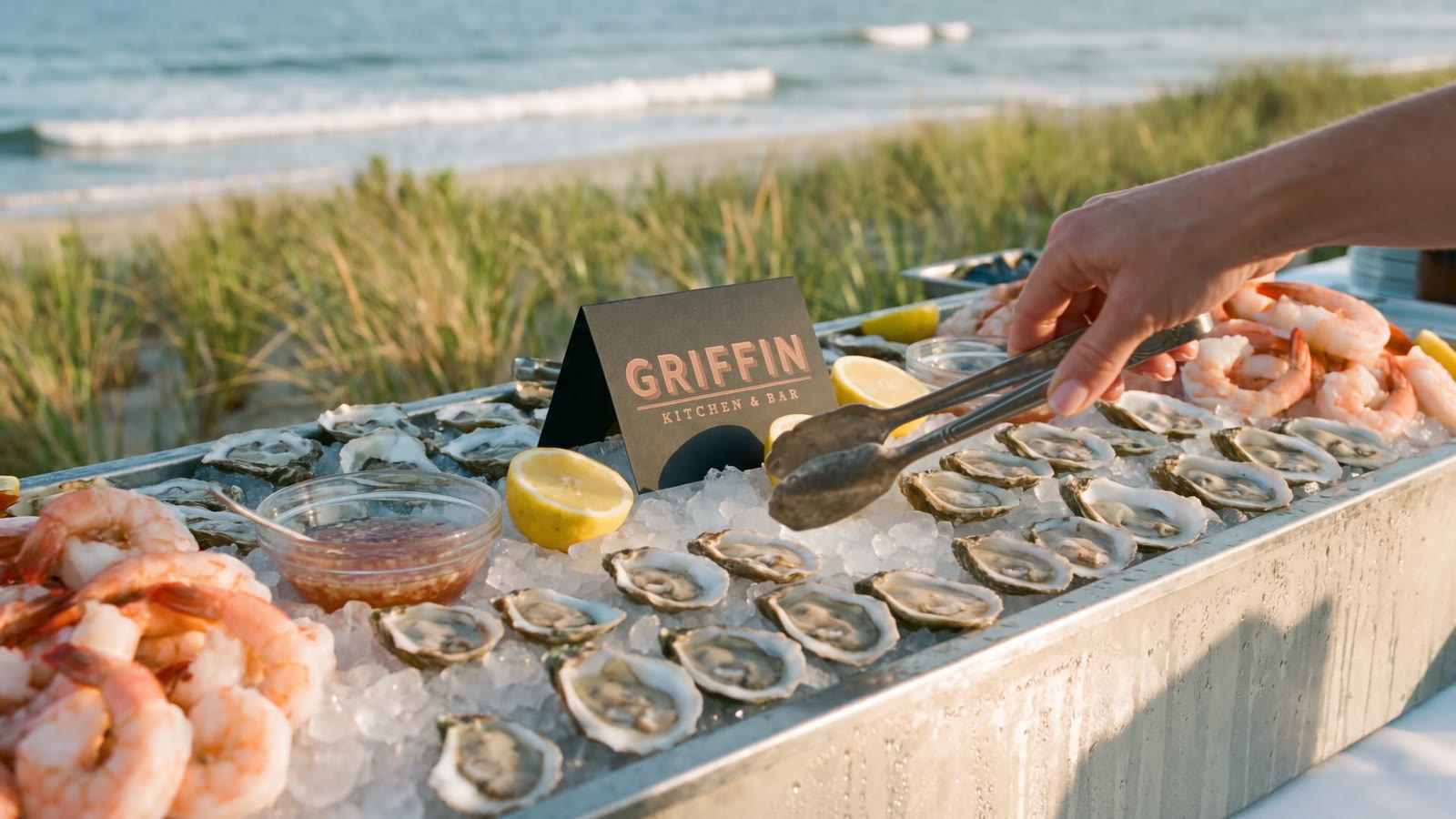 Oysters and shrimp on ice at a Griffin raw bar by the beach
